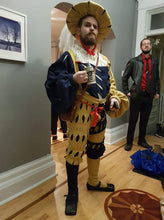 Load image into Gallery viewer, A model shows the 16th century German outfit made with our sewing pattern RH502, Landsknecht Wams & Hosen (man in suit not included)