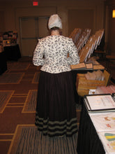 Load image into Gallery viewer, Robin models a late 16th / early 17th century outfit made from RH201, English Jacket & Petticote