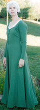 Load image into Gallery viewer, Kass models her reconstruction of RH313 - the Moy Gown. A medieval kirtle dress found in an Irish bog.