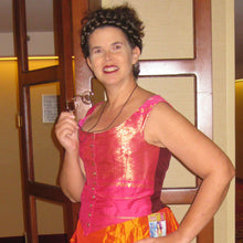 Load image into Gallery viewer, Kass models her Victorian "Steampink" dress, made with our sewing pattern RH943, ladies' basic bodice